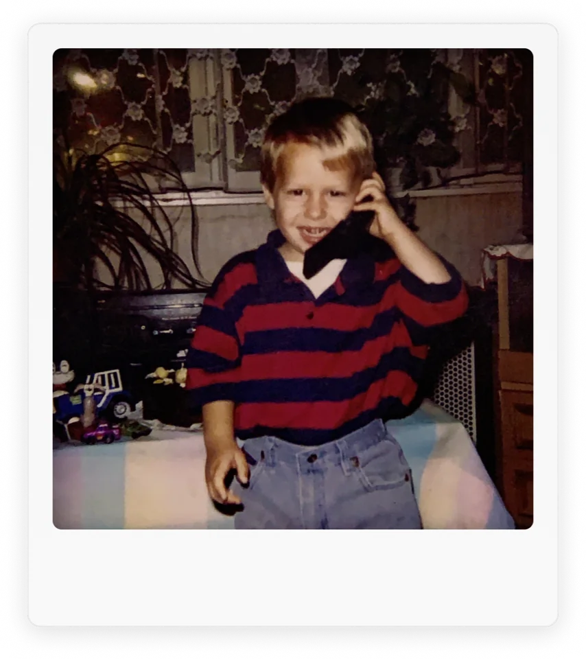 Sandor as a child, talking on the telephone